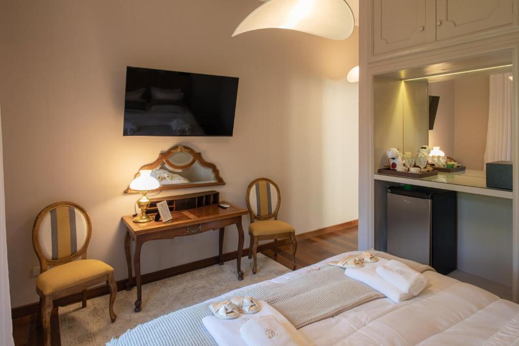 Postel nebo postele na pokoji v ubytování Casa Corbellani