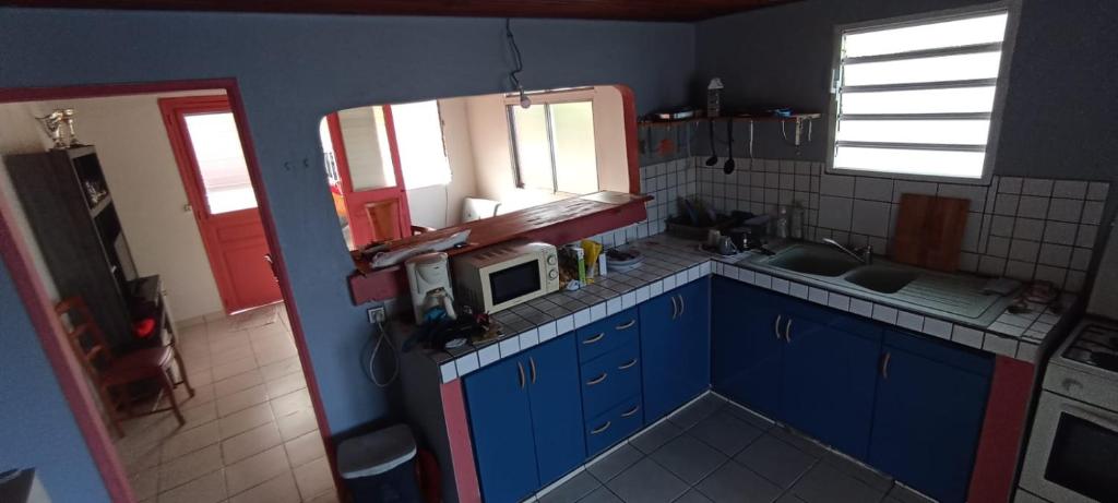 Kuchyň nebo kuchyňský kout v ubytování Maison exurville