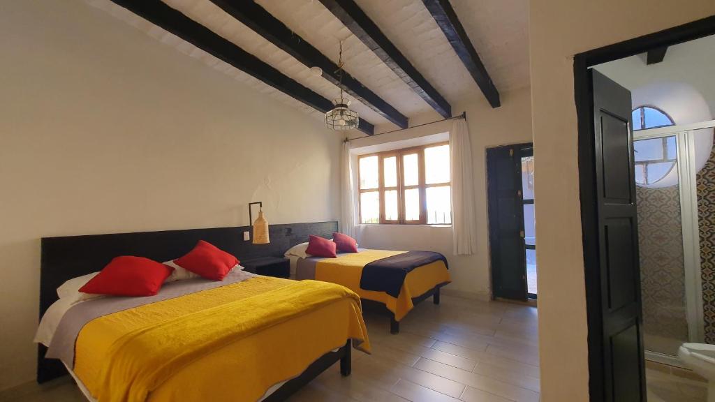 Postel nebo postele na pokoji v ubytování Hotel Sautto