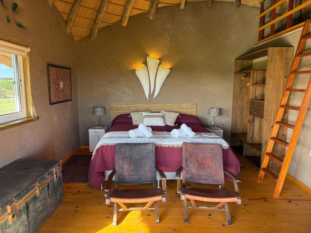 Postel nebo postele na pokoji v ubytování Los Chajá Ecolodge