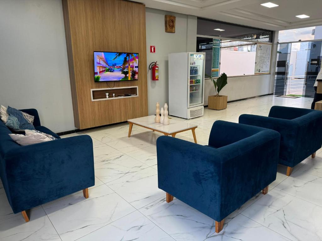 TV a/nebo společenská místnost v ubytování Hotel Serra do Rio