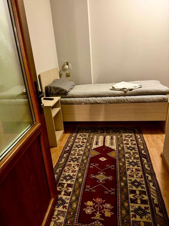 Postel nebo postele na pokoji v ubytování Dodi house