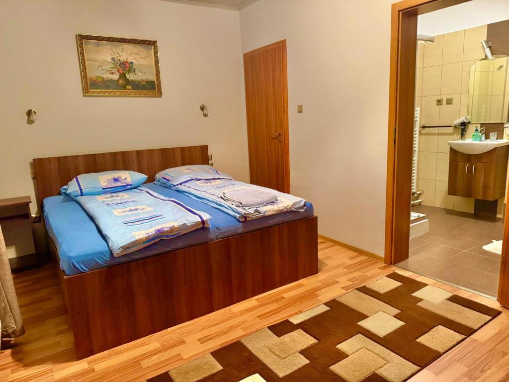 Postel nebo postele na pokoji v ubytování Dodi house
