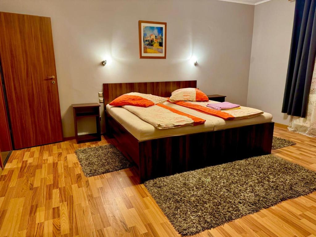 Postel nebo postele na pokoji v ubytování Dodi house