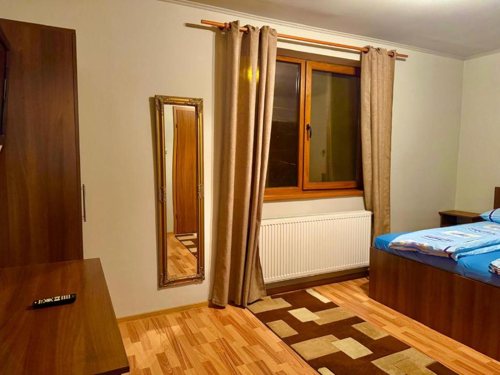 Postel nebo postele na pokoji v ubytování Dodi house