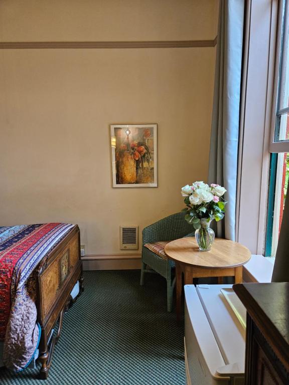 Postel nebo postele na pokoji v ubytování Hotel Planter