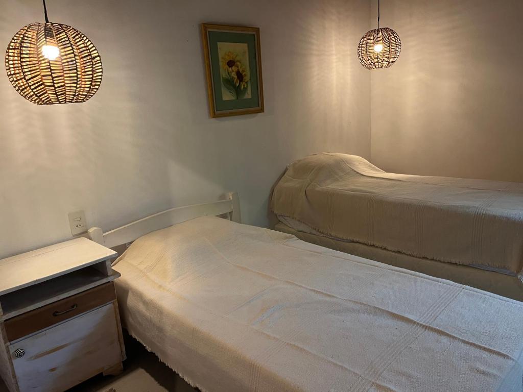 Postel nebo postele na pokoji v ubytování Cabaña 8 vientos