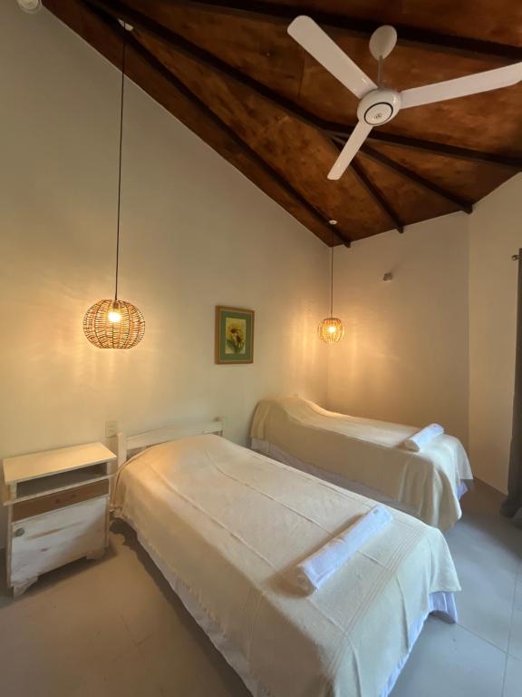 Postel nebo postele na pokoji v ubytování Cabaña 8 vientos