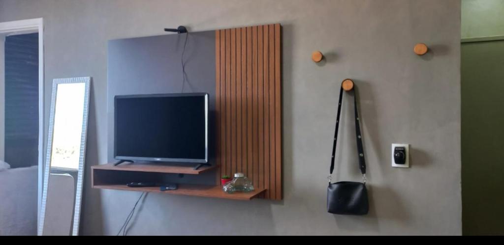 TV a/nebo společenská místnost v ubytování Refúgio do teleferico