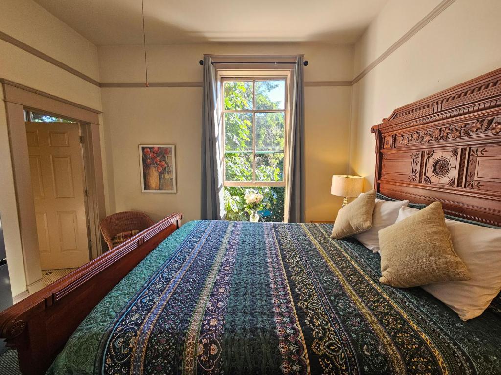 Postel nebo postele na pokoji v ubytování Hotel Planter