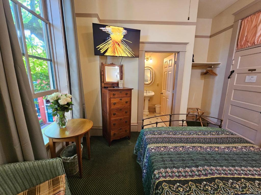Postel nebo postele na pokoji v ubytování Hotel Planter