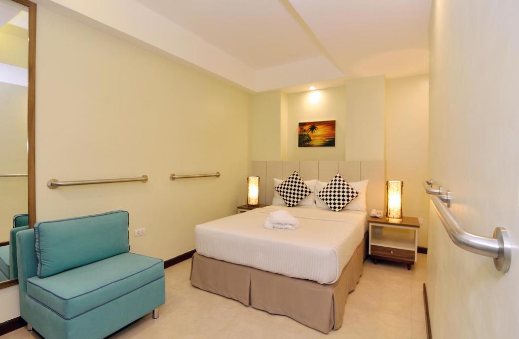 Postel nebo postele na pokoji v ubytování Belian Hotel