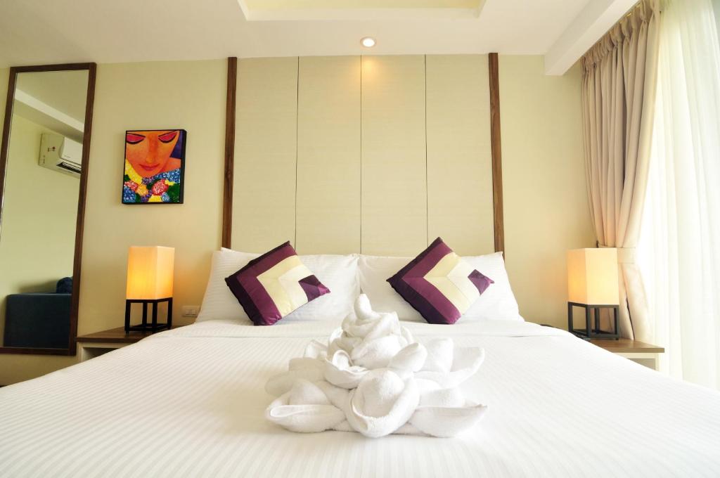 Postel nebo postele na pokoji v ubytování Belian Hotel