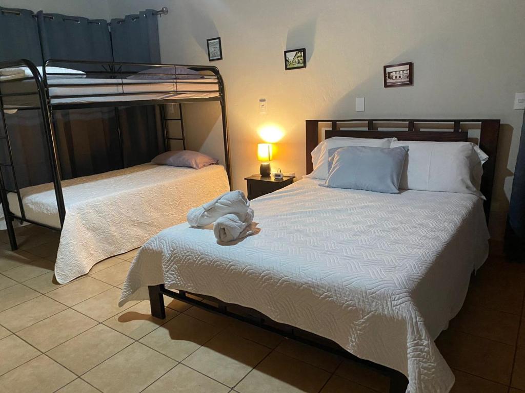 Postel nebo postele na pokoji v ubytování daBene - Bed & Breakfast