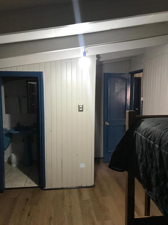 Postel nebo postele na pokoji v ubytování Hostal Maravillas del Sur