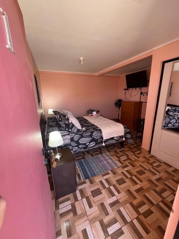 Letto o letti in una camera di Hostal el hermanito