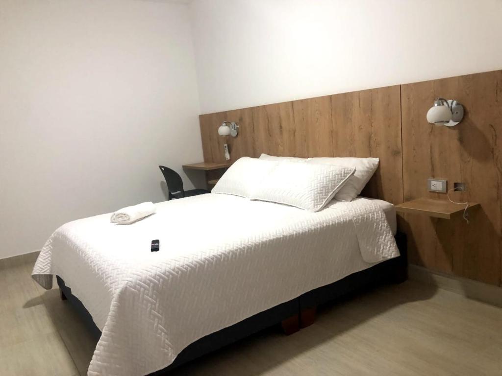 Postel nebo postele na pokoji v ubytování Hotel Divaca