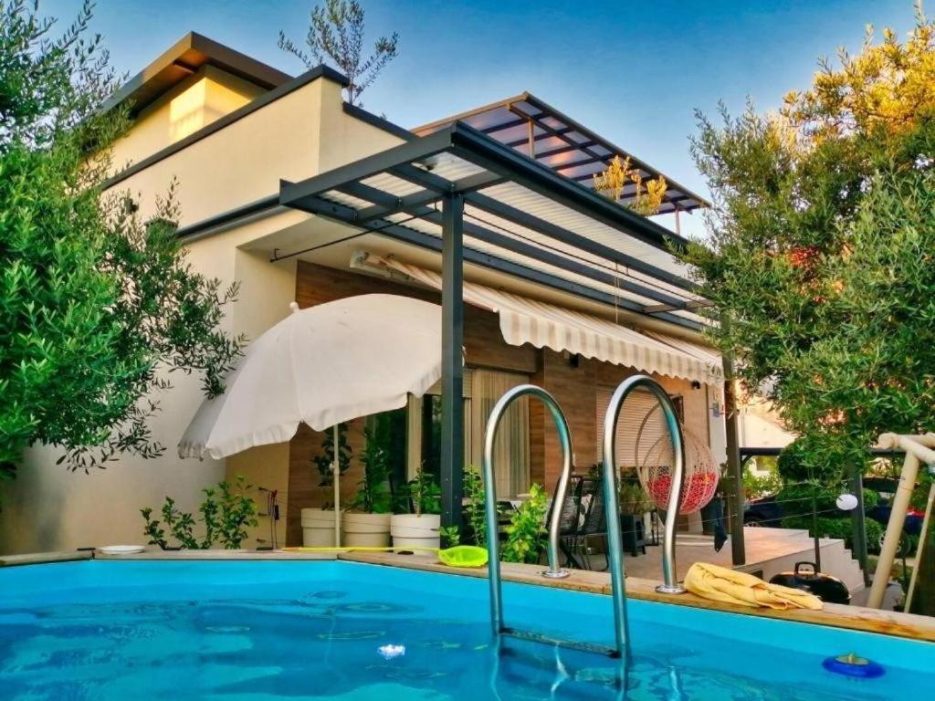 Apartments with swimming pool Vodice - 23696