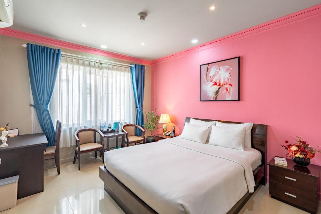Postel nebo postele na pokoji v ubytování La Serena Hotel & Apartment