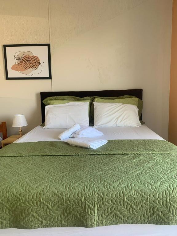 Postel nebo postele na pokoji v ubytování Simar Hotel