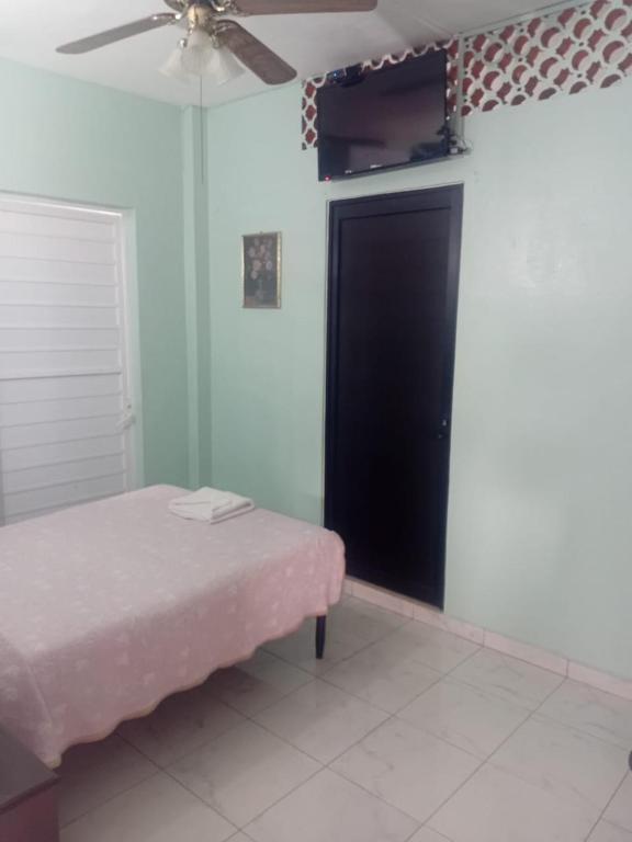 Postel nebo postele na pokoji v ubytování HOTEL ACUARIO CATEMACO