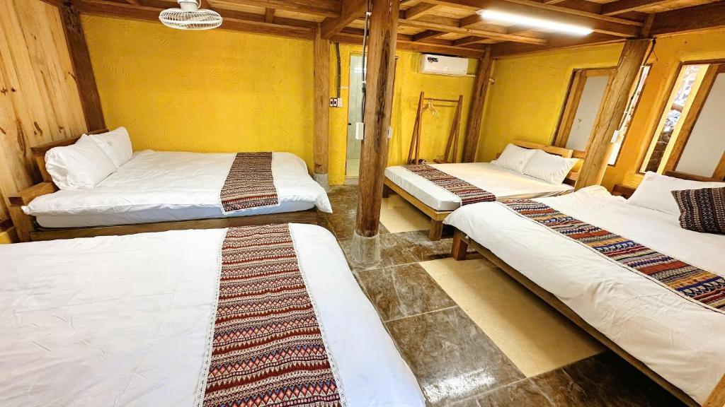 Voodi või voodid majutusasutuse HaPu Homestay toas