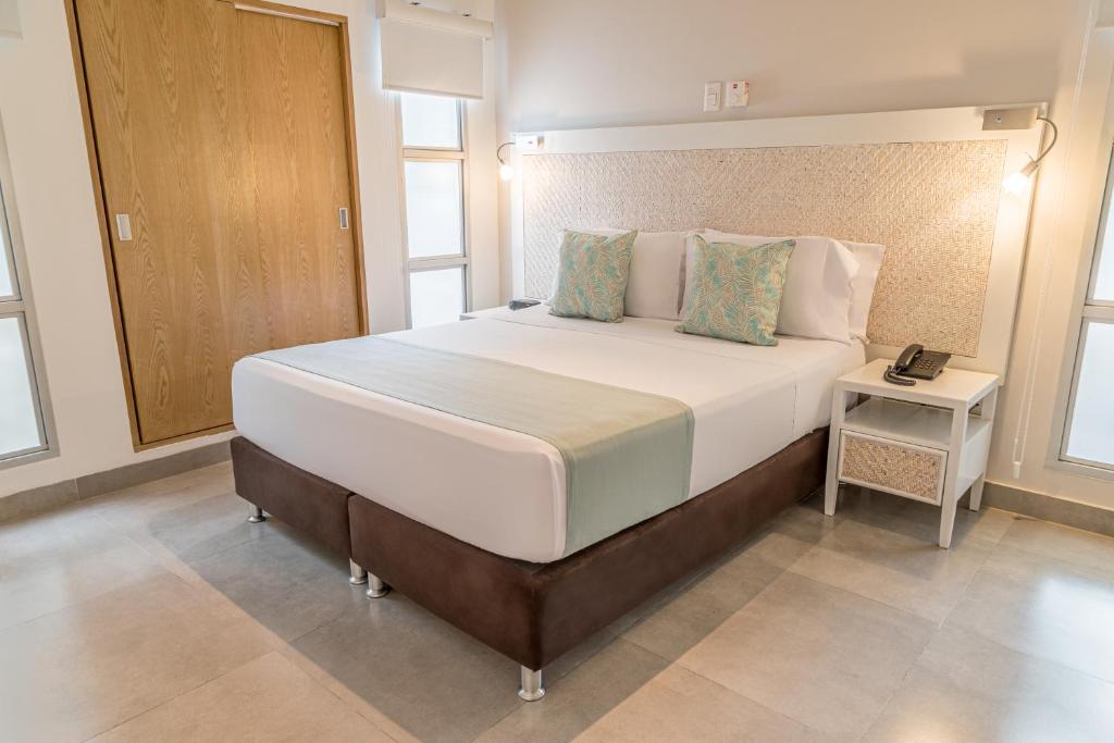 Postel nebo postele na pokoji v ubytování Hotel Irotama Bungalows & Bohios