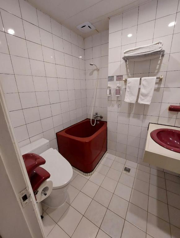 Koupelna v ubytování GAWA Hotel