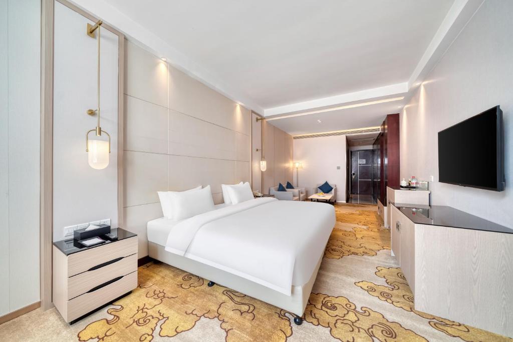 TV a/nebo společenská místnost v ubytování Dayhello Hotel Shenzhen Shekou
