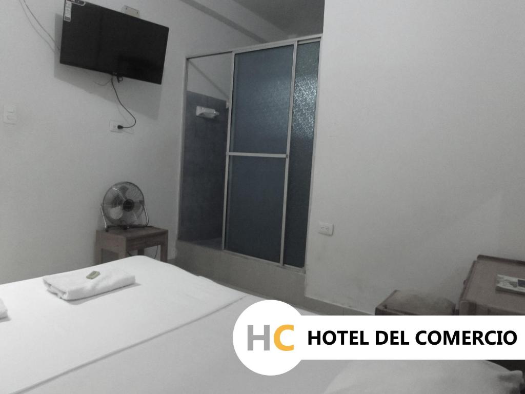Postel nebo postele na pokoji v ubytování Hotel del Comercio