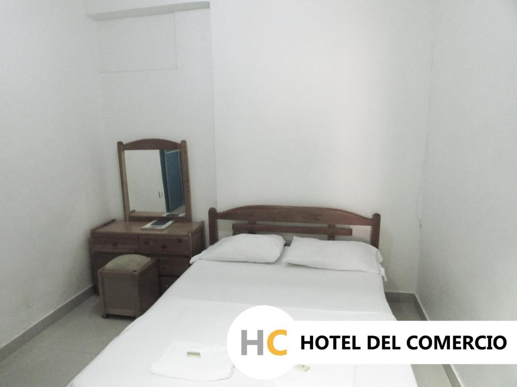 Postel nebo postele na pokoji v ubytování Hotel del Comercio