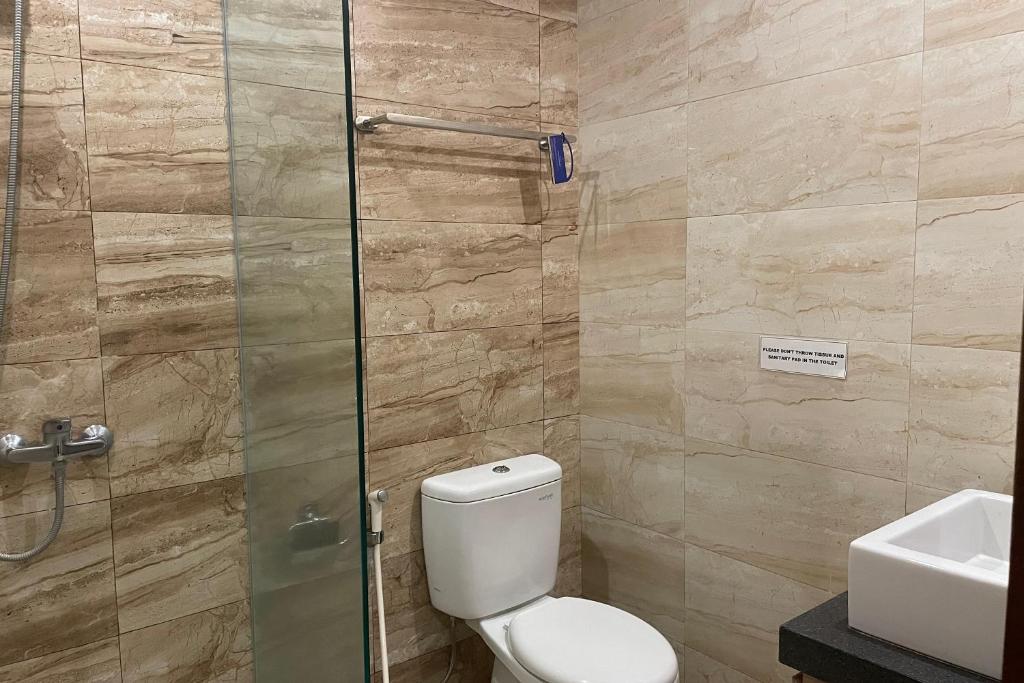 Koupelna v ubytování Singgah Hotel Seminyak