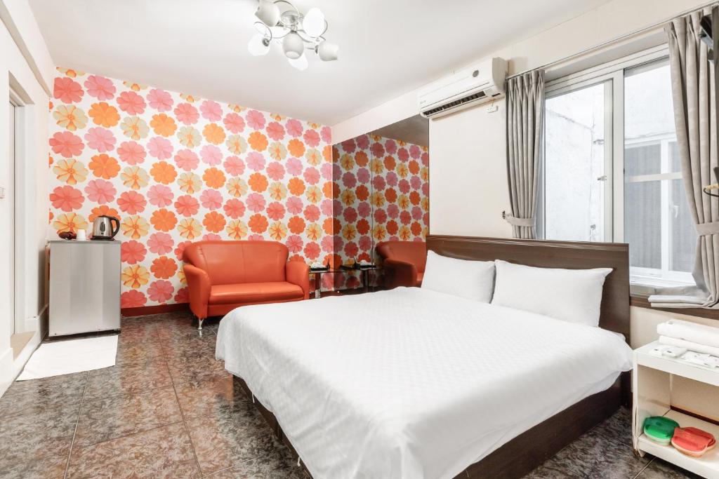 Postel nebo postele na pokoji v ubytování Rich House B&B