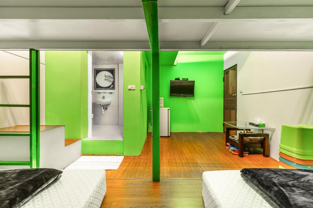 TV a/nebo společenská místnost v ubytování Rich House B&B