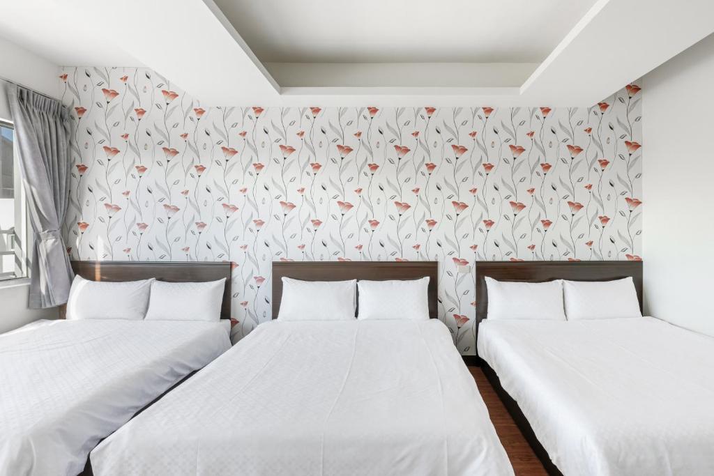 Postel nebo postele na pokoji v ubytování Rich House B&B
