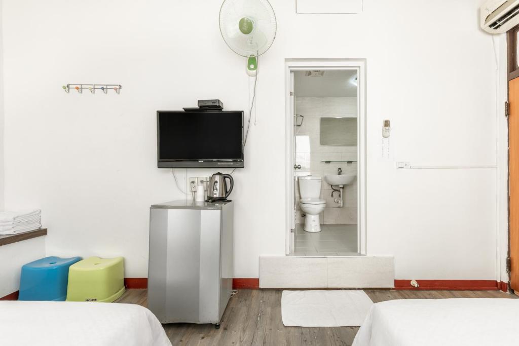 TV a/nebo společenská místnost v ubytování Rich House B&B