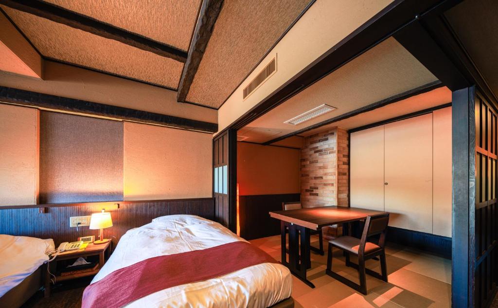 Postel nebo postele na pokoji v ubytování Fuji Lake Hotel