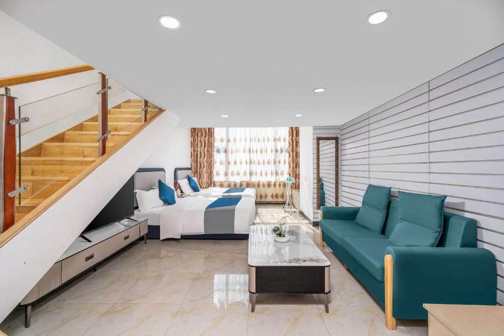 Area soggiorno di Guangzhou Youke Serviced Apartment1min to Line5 Taojin STN-Free shuttle bus during the Canton Fair