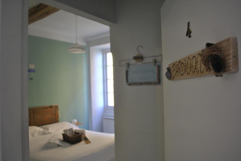 Фотография из галереи Al Piccolo Scoglio - Room & Breakfast в Камольи
