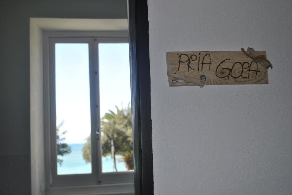 Фотография из галереи Al Piccolo Scoglio - Room & Breakfast в Камольи