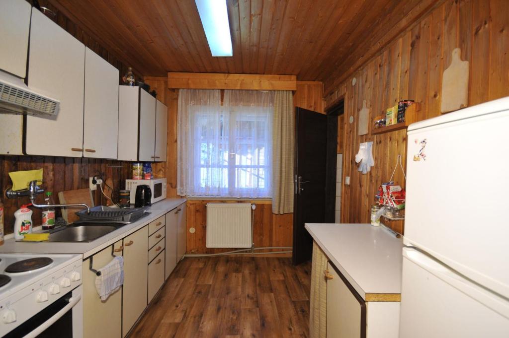 Kuchyň nebo kuchyňský kout v ubytování Chata Lieska