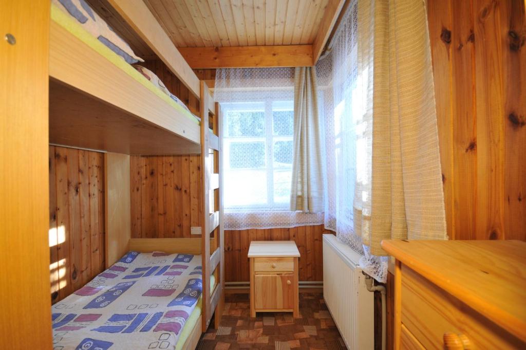 Postel nebo postele na pokoji v ubytování Chata Lieska