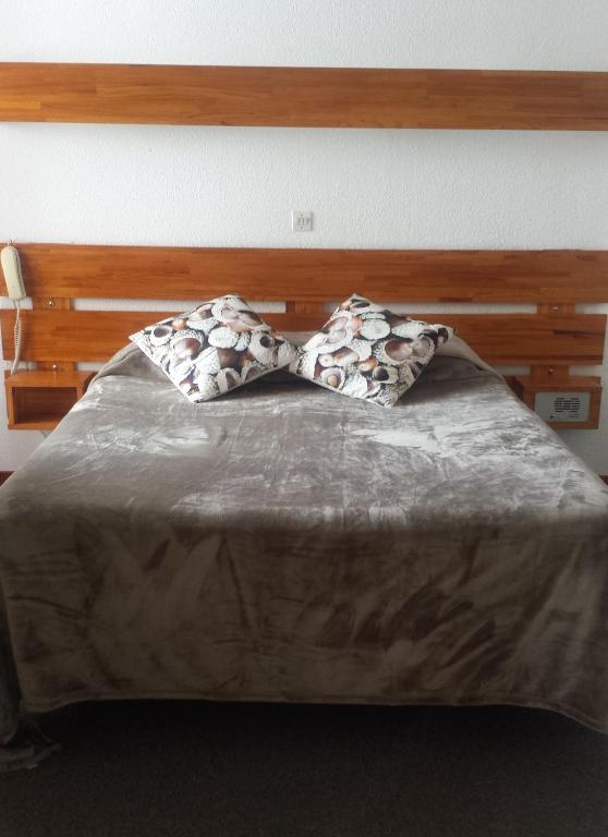Postel nebo postele na pokoji v ubytování Hôtel Yaka