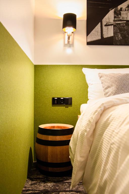 Postel nebo postele na pokoji v ubytování De BrauHotel