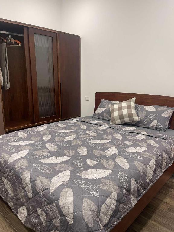 Postel nebo postele na pokoji v ubytování HnH Homestay 2