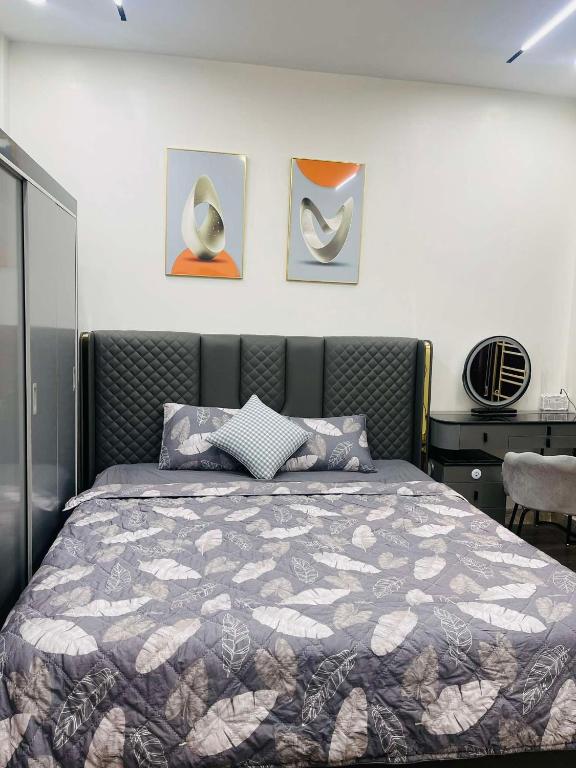 Postel nebo postele na pokoji v ubytování HnH Homestay 2
