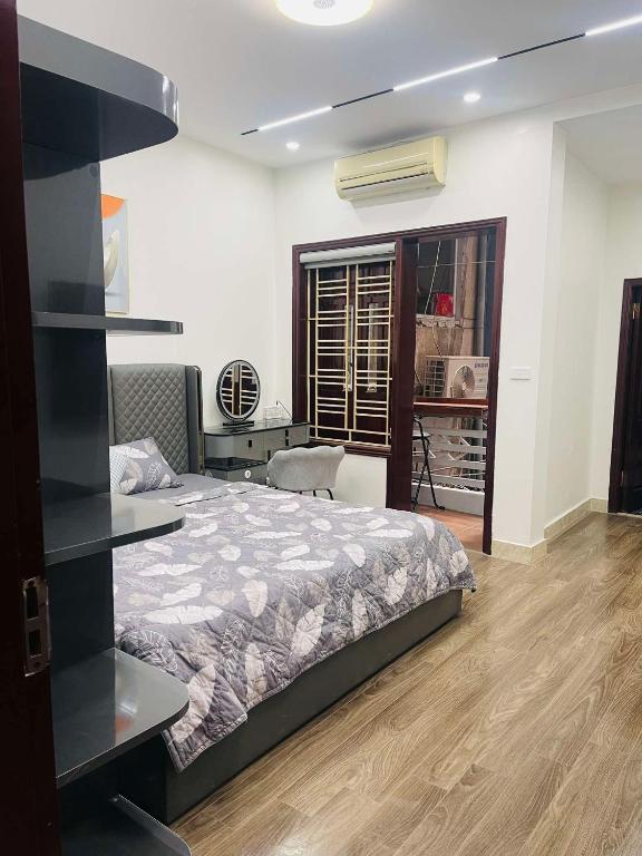 Postel nebo postele na pokoji v ubytování HnH Homestay 2