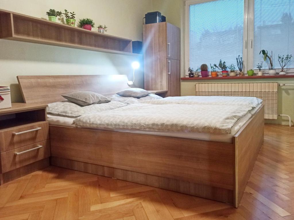 Postel nebo postele na pokoji v ubytování Apartmán na Perunské