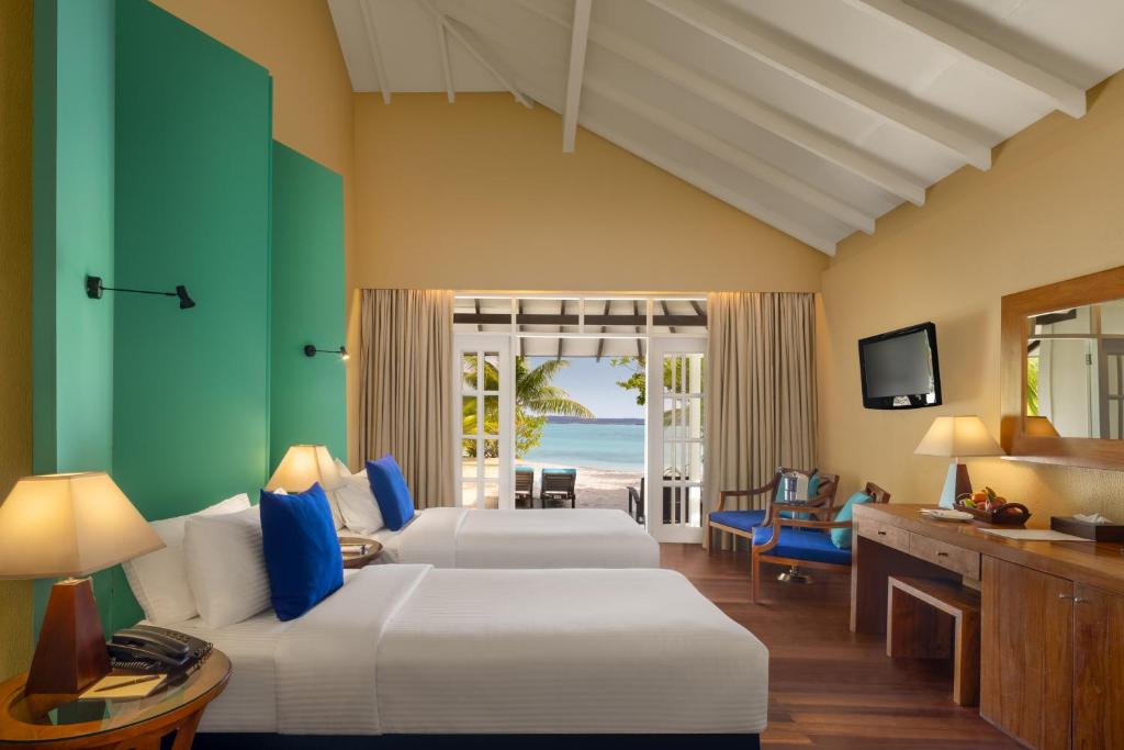 TV a/nebo společenská místnost v ubytování Adaaran Select Meedhupparu - Complimentary Stay for 1 Child for Stays between April 2025 to September 2025