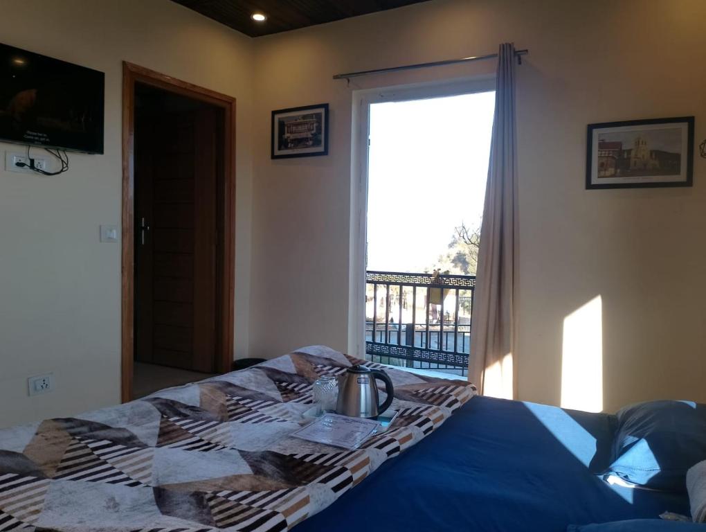 Postel nebo postele na pokoji v ubytování Himalayan view stay - Pahado wala ghar